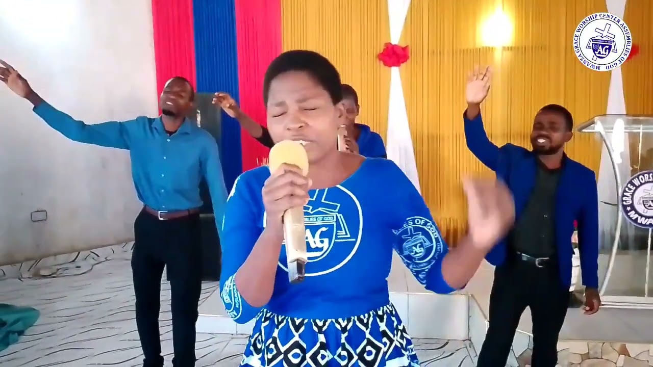 MAYIMBIDWE OKOMA FROM GRACE WORSHIP CENTRE PRAISE TEAM 