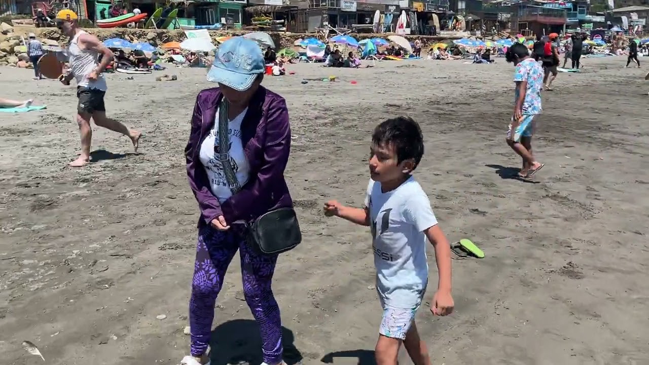Mother and son in beach