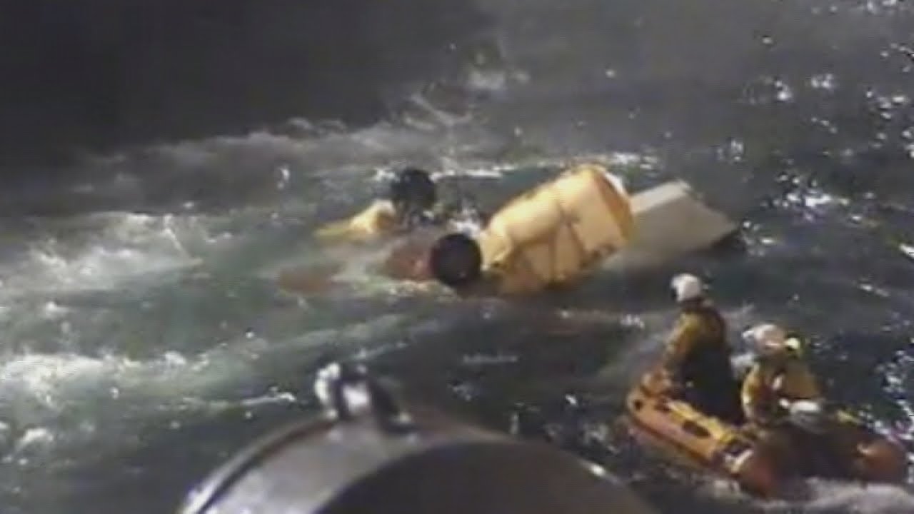 RNLI dramatically battles storm to salvage helicopter wreck after fatal crash in North Sea