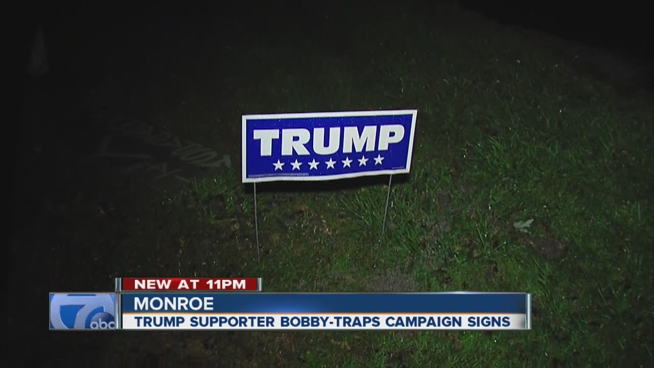 Woman booby traps Trump signs