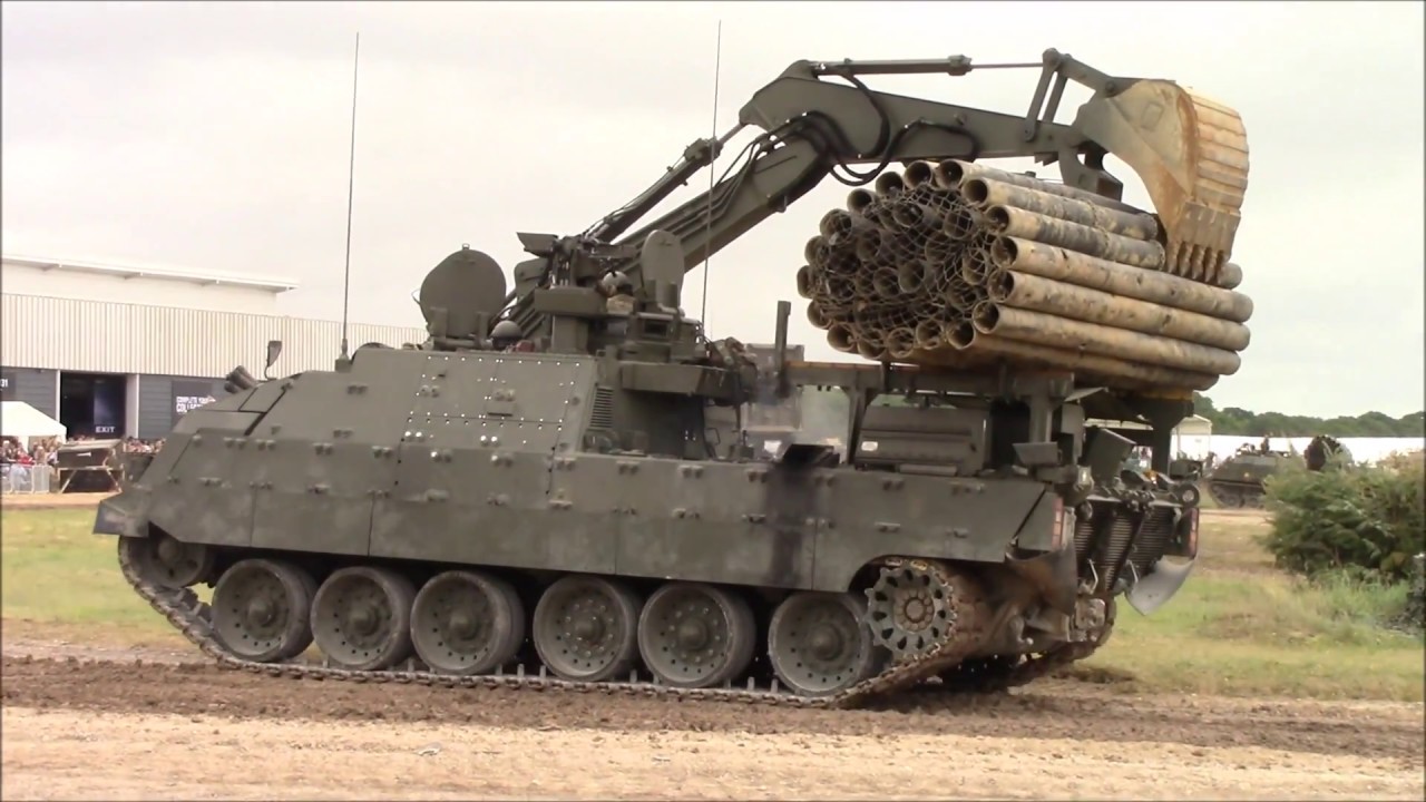Trojan AVRE handling a pipe fascine bundle (based on Challenger 2 tank chassis)