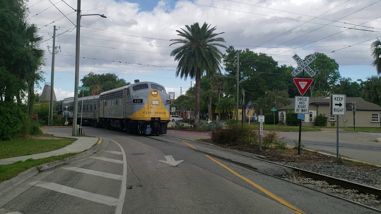 Clinchfield F7 rolls out of Tavares w passenger train in tow.