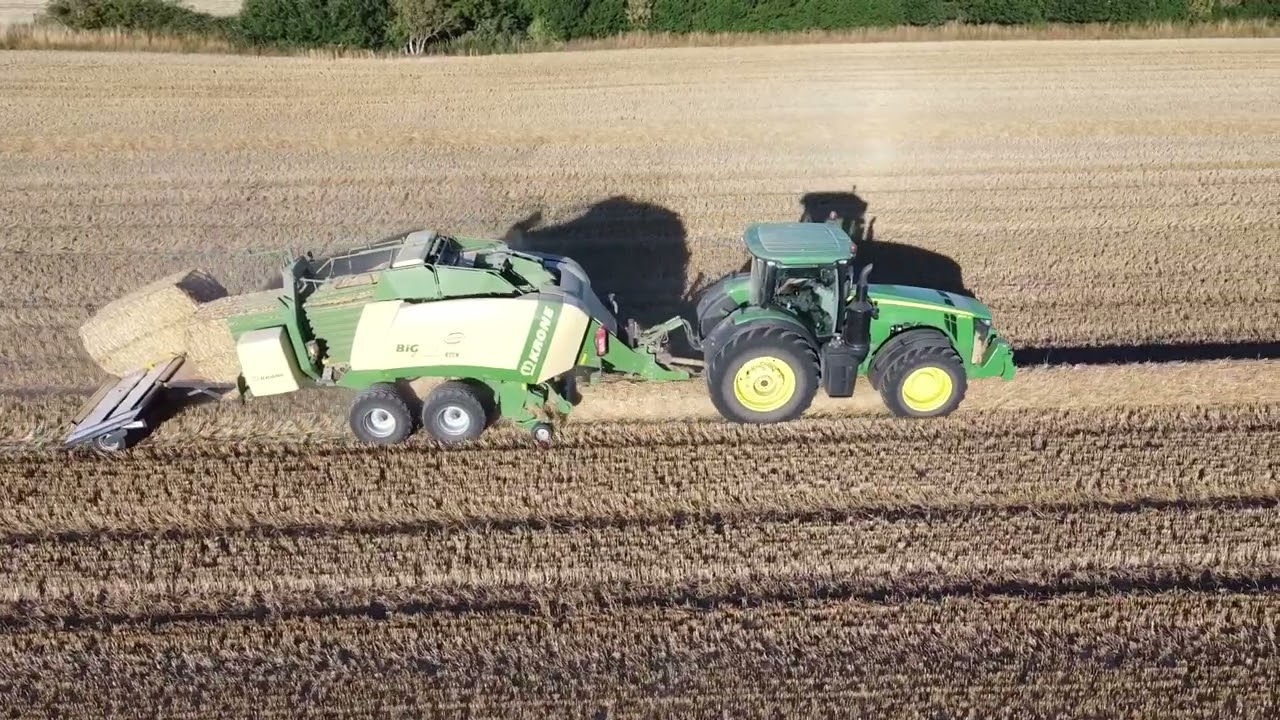 John Deere 8370R m Krone Big Pack baler, at Hudevad Vestergård, Denmark