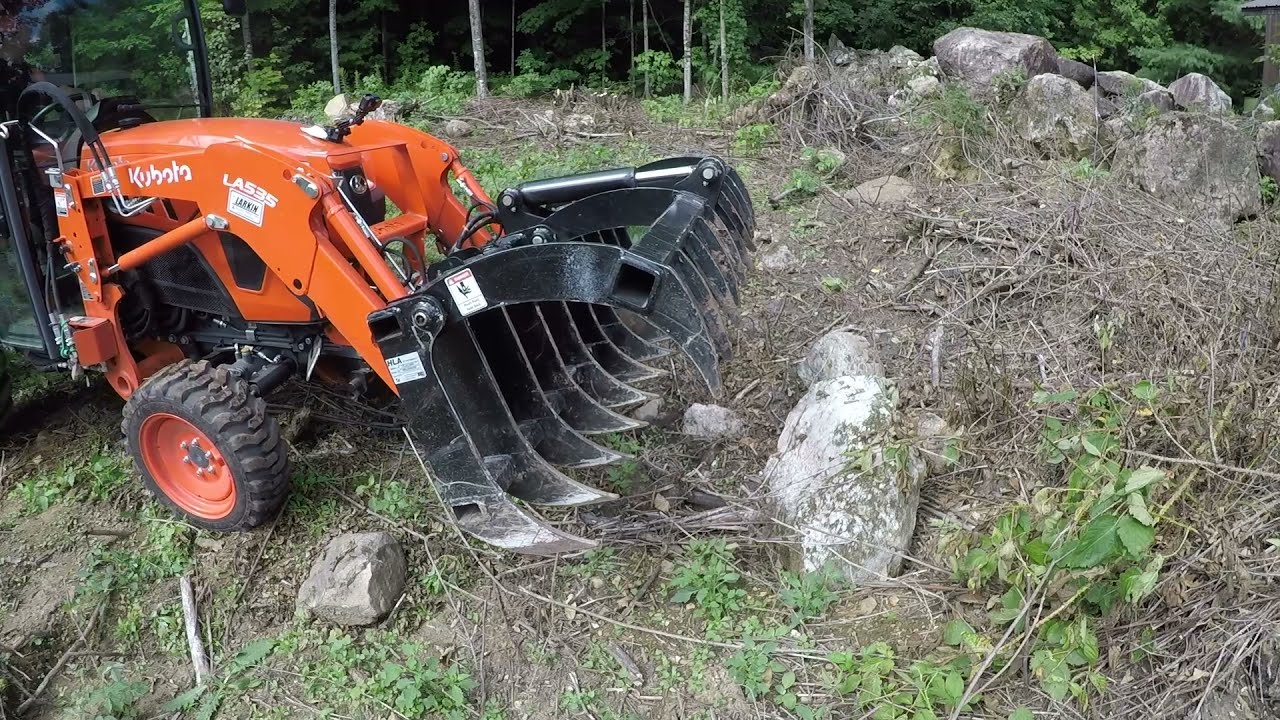 458 Clearing Dead Wood and Boulders.Target Range. Kubota LX2610. Oregon CS300 Battery Chainsaw.