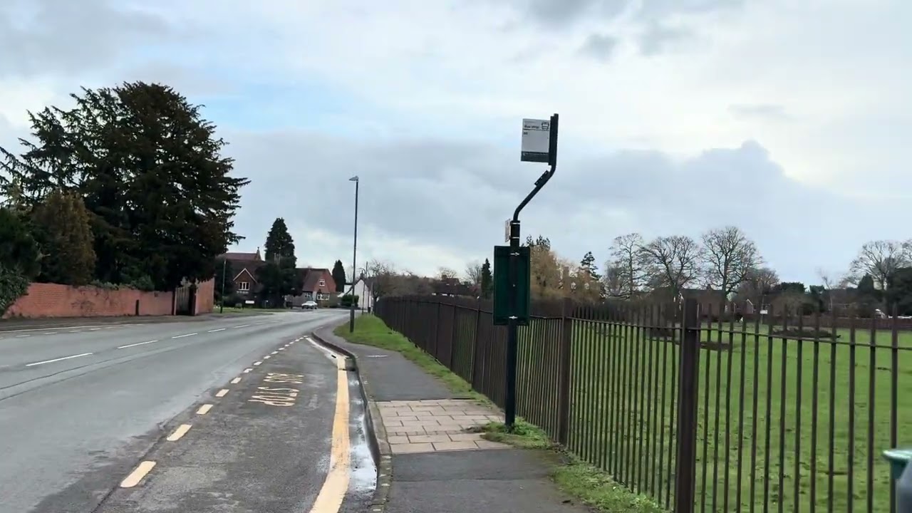 Walk along Main Street in Wolston. Past the river Avon. 