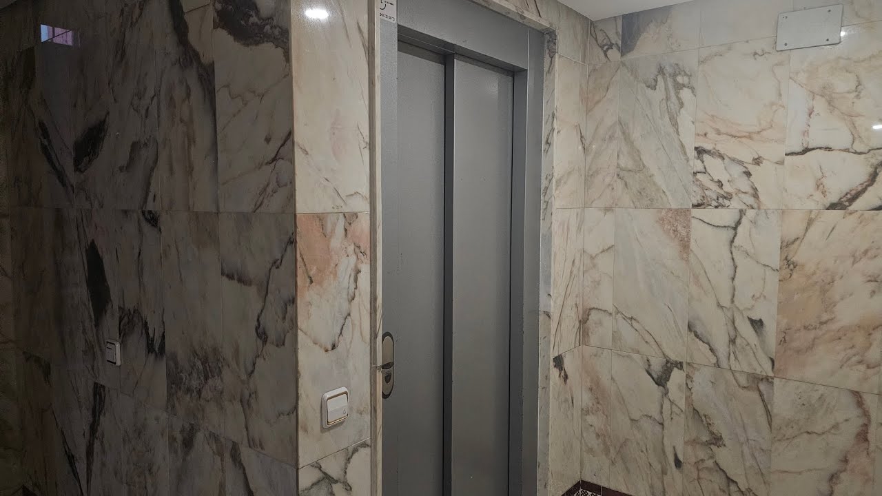2x Orona elevator at C. Pérez Hervás 5 in Seville, Spain