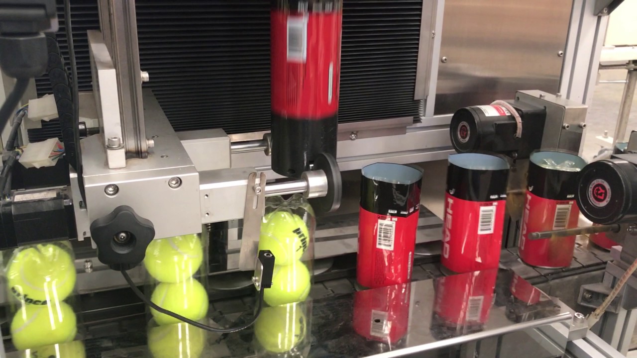 Shrink sleeving machine for PET cans