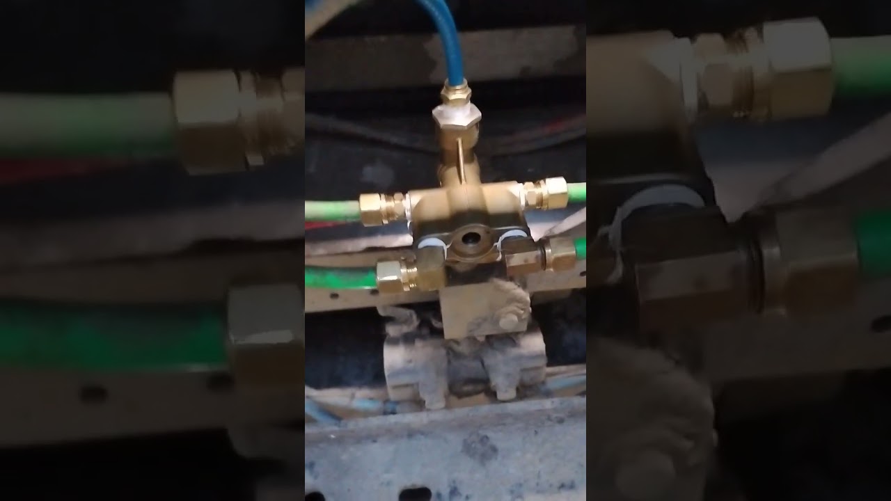 Air brakes not releasing on trailer or  back feeding when setting brakes