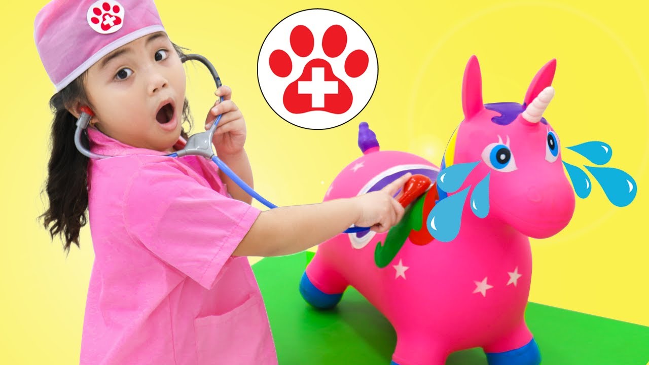 Annie Pretend Play as the Pet Doctor Helping Animals
