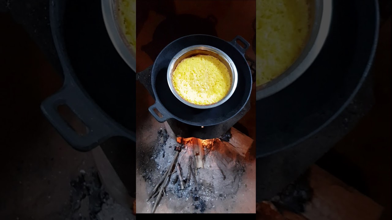 Bake a cake or bread without an oven on an open fire in rural Bhutan