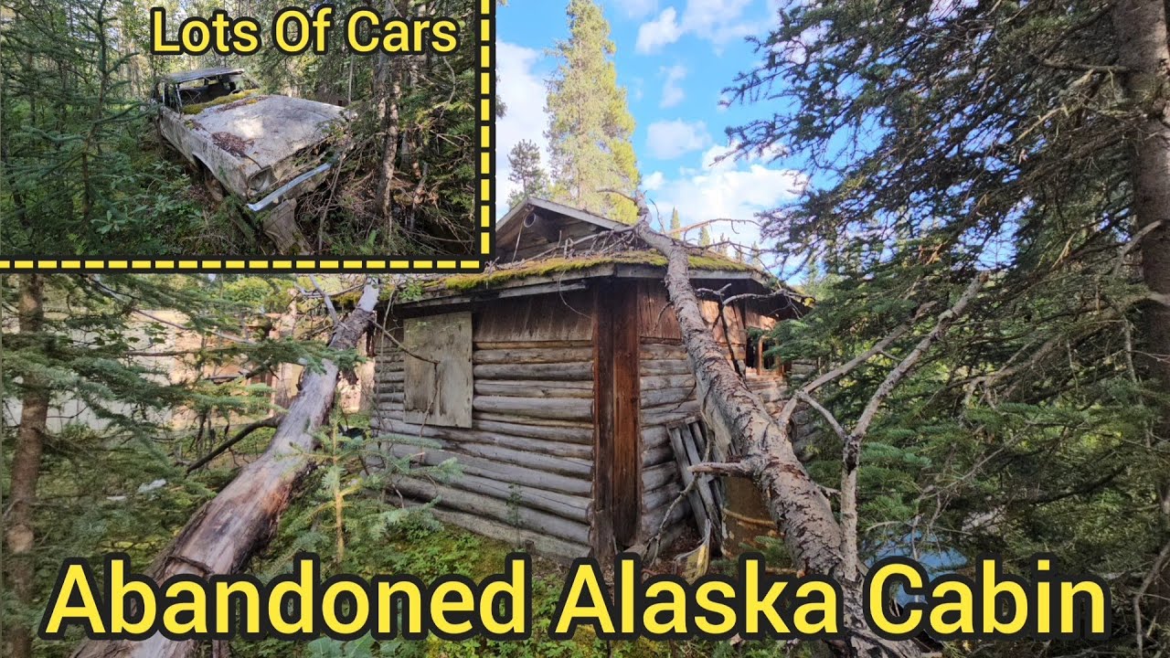 Abandoned Alaska Wilderness Log Cabin With Lots Of Cars And Other Buildings 
