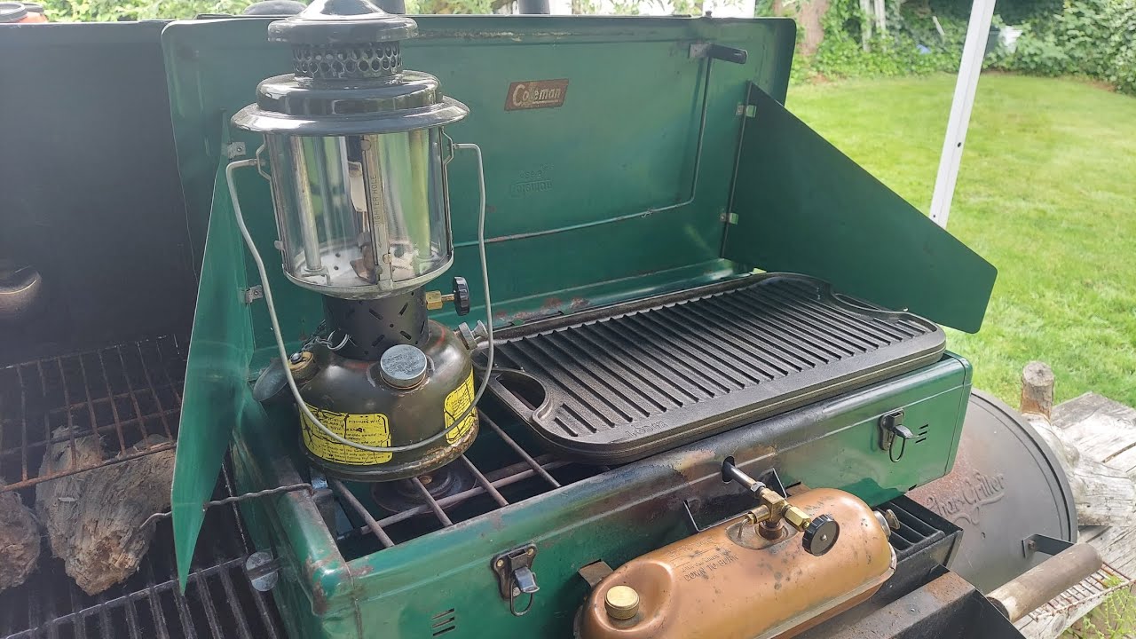 Memorial Day Steaks! Featuring 1965 Coleman Mil-Spec lantern, Coleman 426B, and Lodge Grid Iron.
