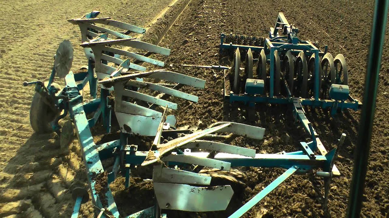 Fendt Favorit 511 C mit Rabe Pflug