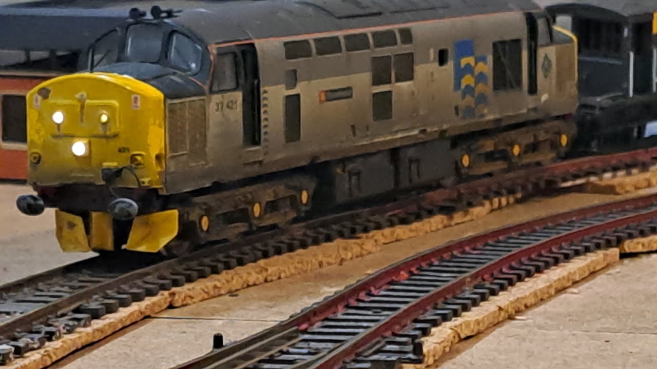 A busy evening oo gauge model railway 