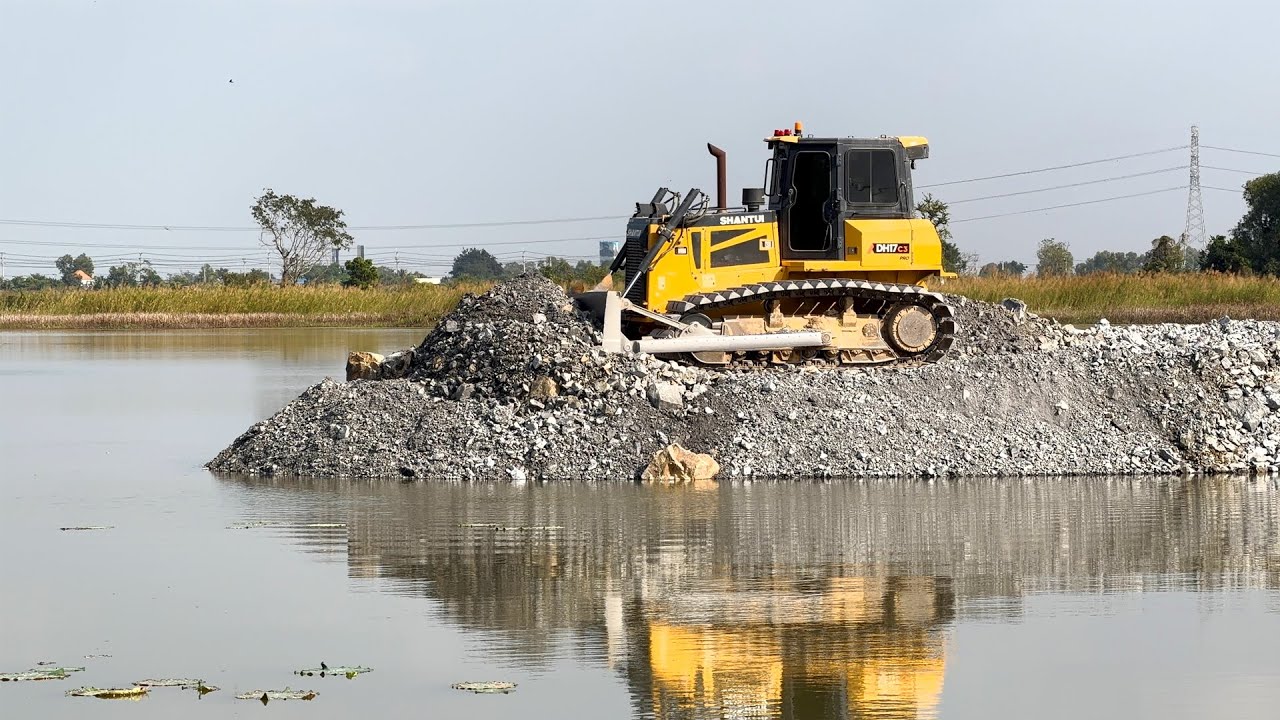 Wonderful Shantui C3 Bulldozer Push Rock Into Water With 25Ton Dump Trucks Filling Rock
