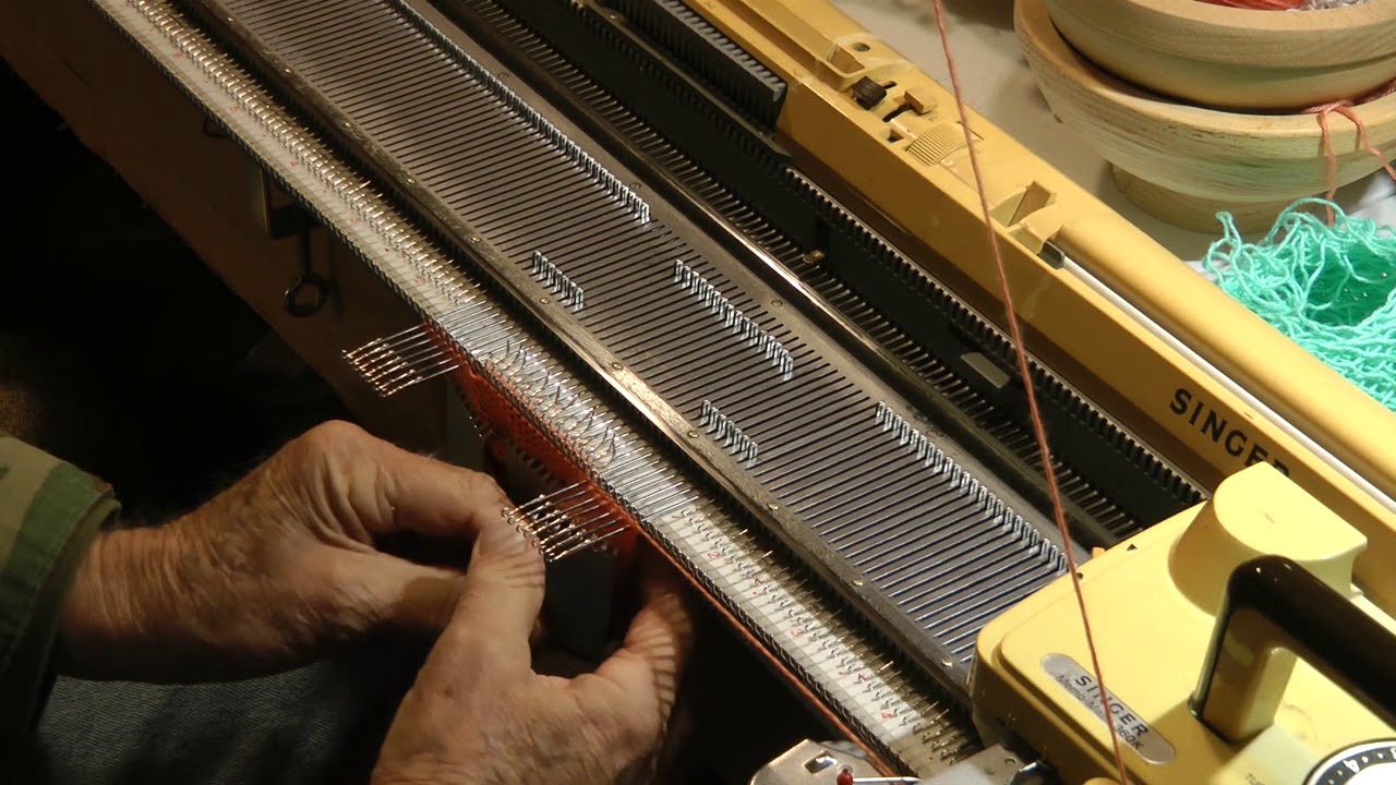 Sock knitting, forming heel and toe pockets on a Singer 360K machine