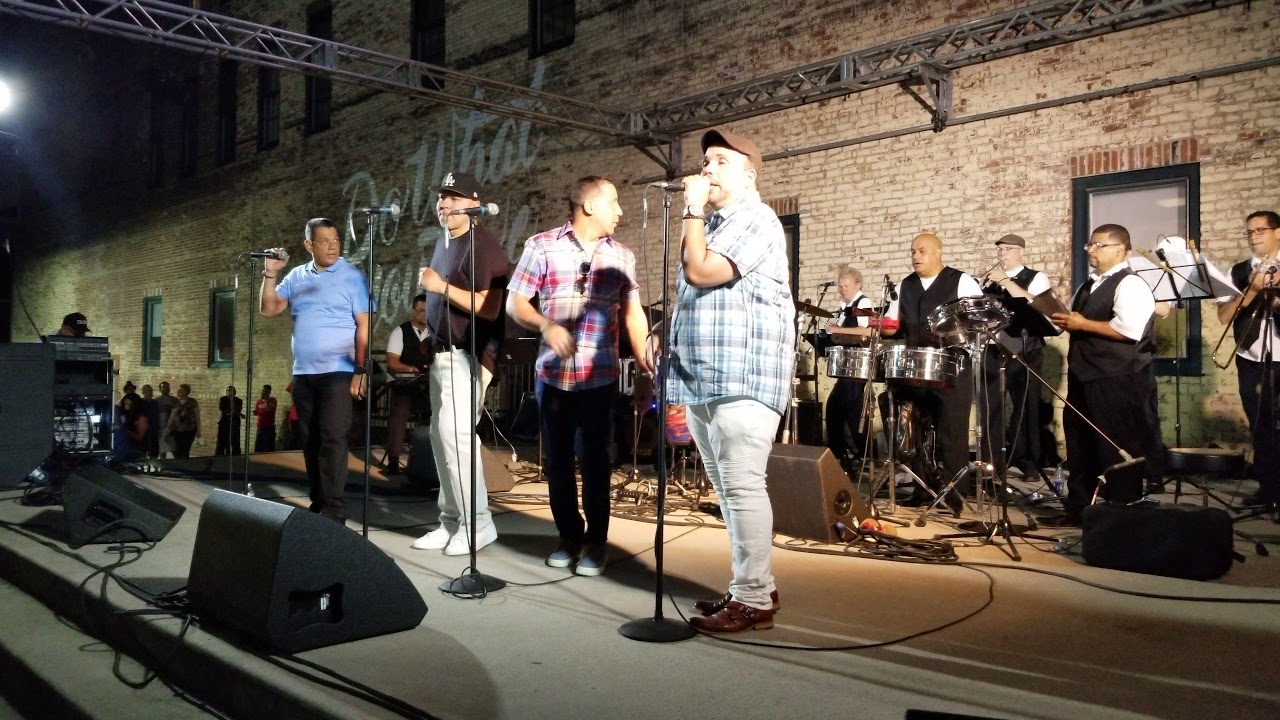 Hundreds of people dancing Salsa in Philadelphia with Edgar Joel , Angel Rios on lead vocals.