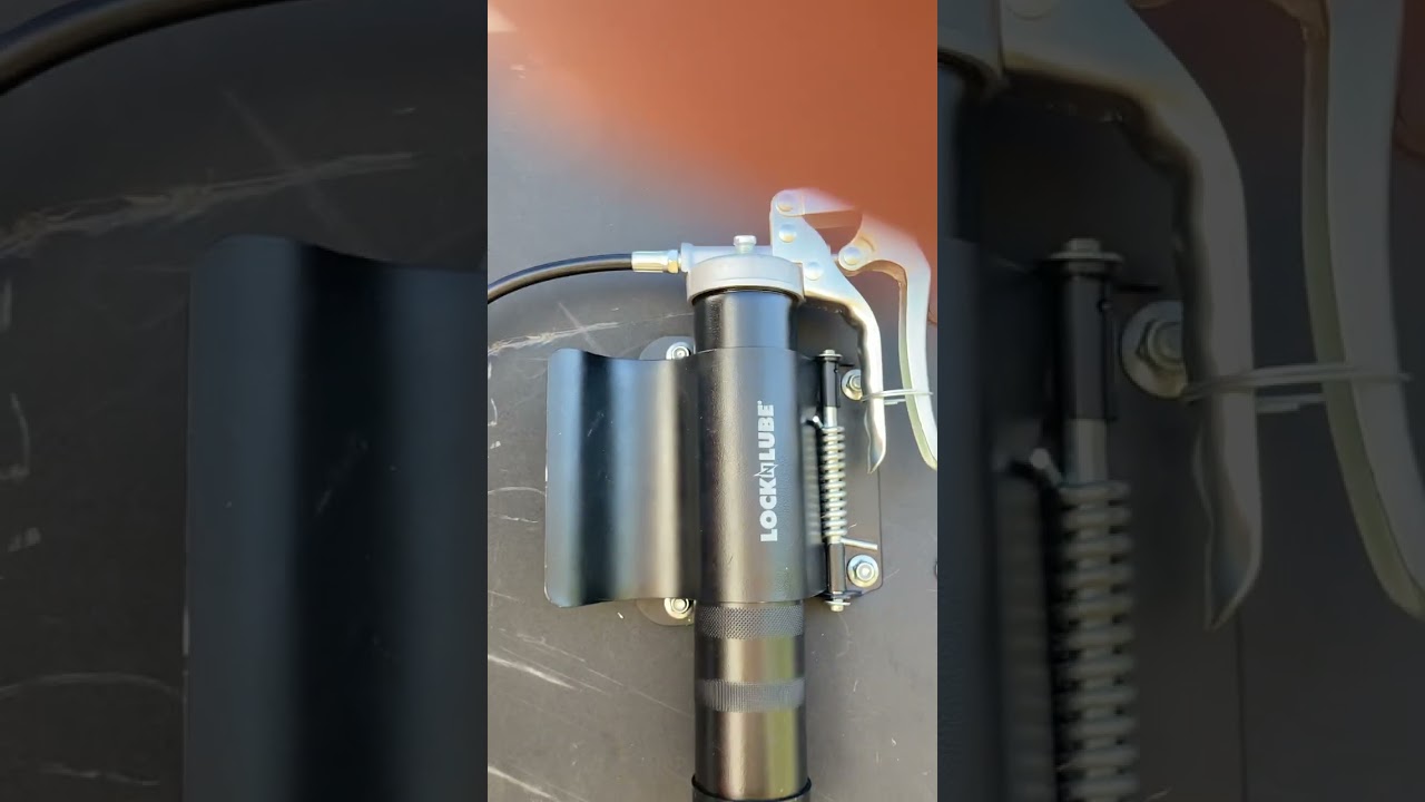 Worlds best Grease gun holder for the field mobile tech by lock&lube !!
