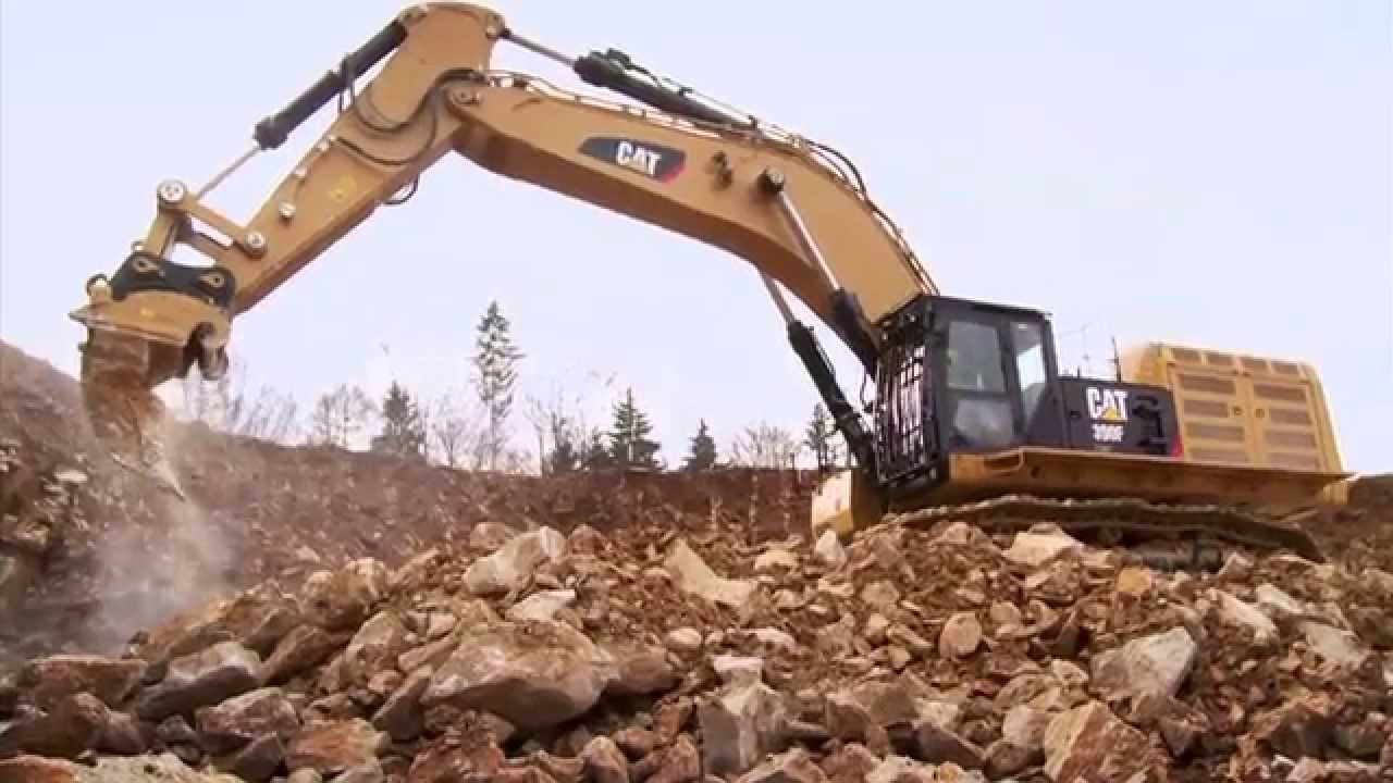 Cat&reg; 390F L Excavator at Work Ripping Large Rocks