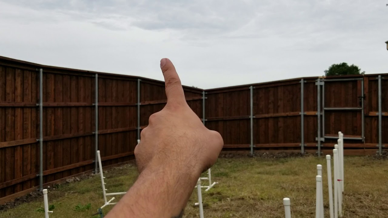 Installing a metal frame gate on a wood fence - Moore Construction Co.