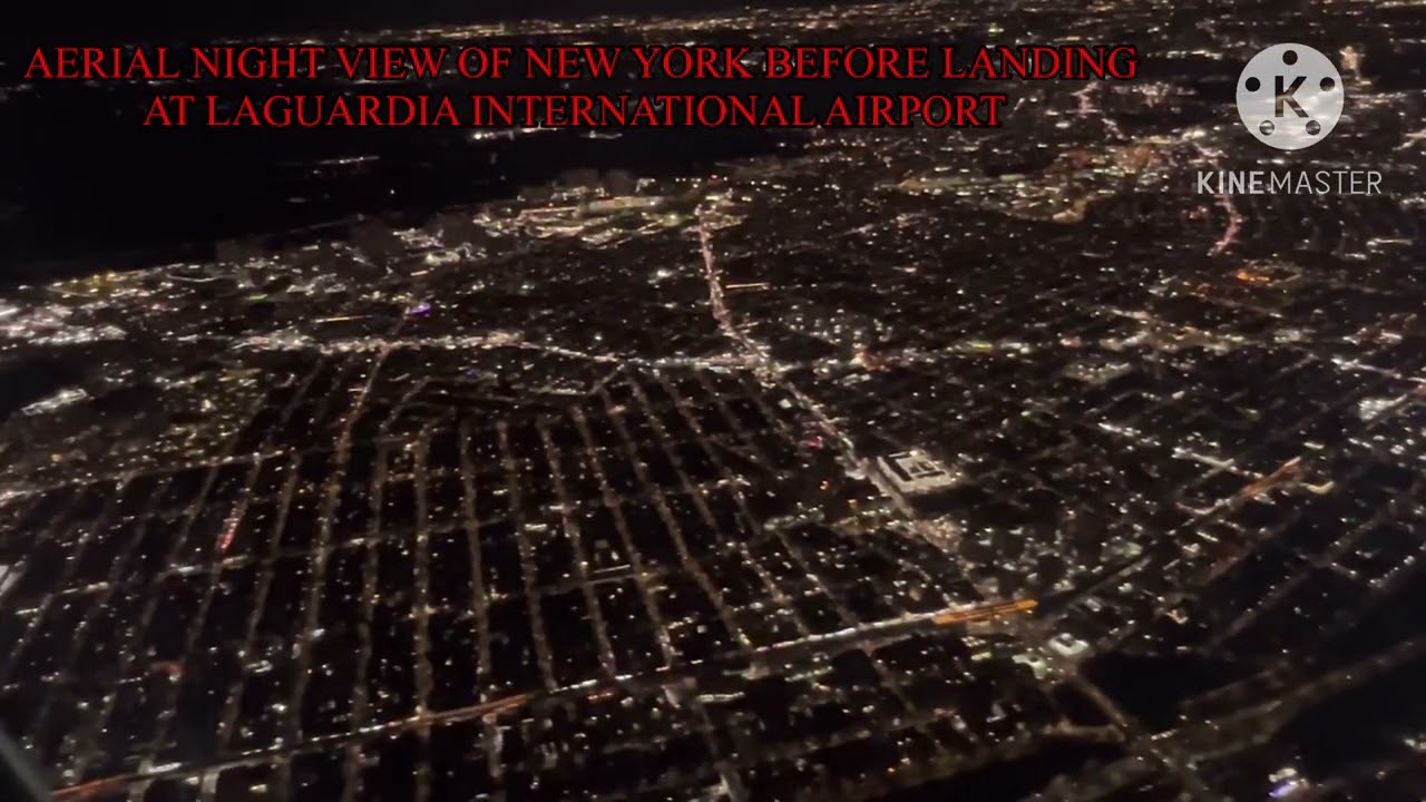 MAGNIFICENT AERIAL NIGHT VIEW OF NEW YORK BEFORE LANDING AT LAGUARDIA INTERNATIONAL AIRPORT