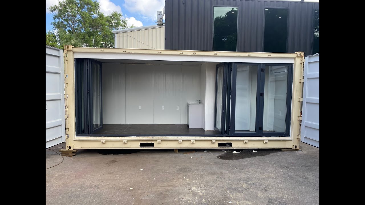 open side shipping container glass door installation