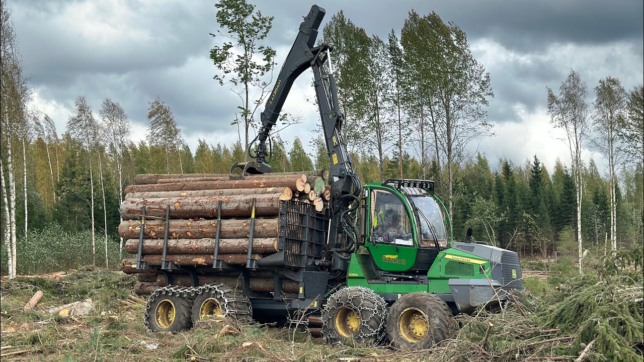 Ihanku ajais kottikärrillä puita -John Deere 1010G-