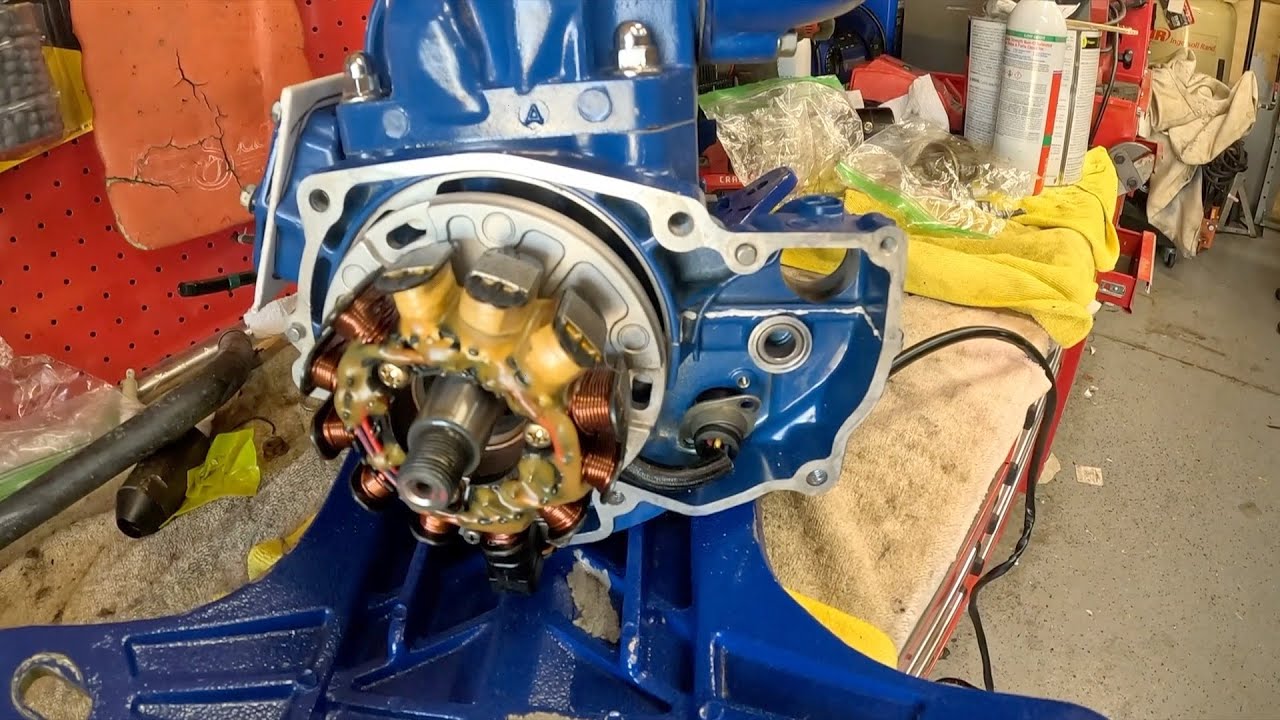 Polaris 750 stator, flywheel, starter and exhaust manifold assembly