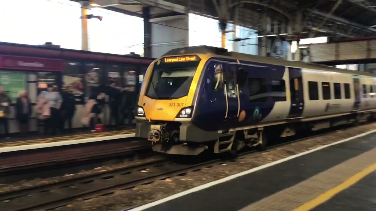Northern class 331 coming into Preston as for a class 221 in the back ground and northern 195 leavin