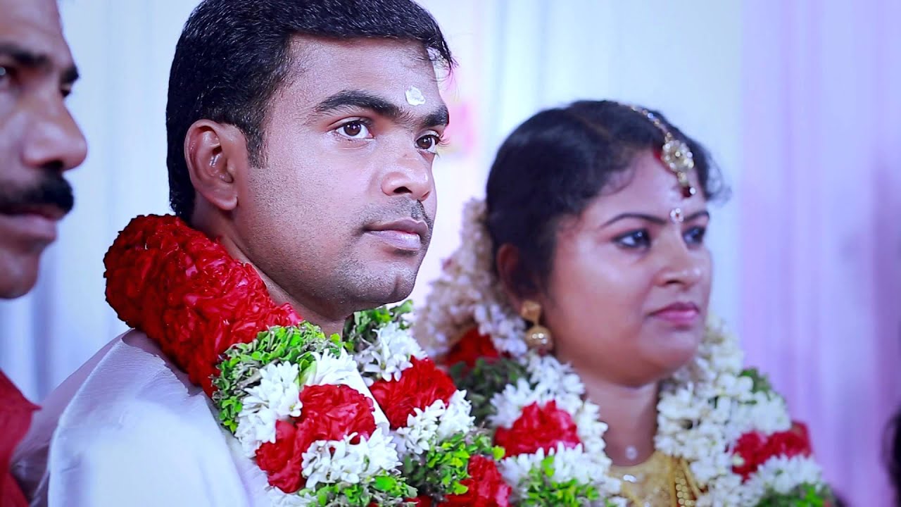 Rajesh + Divya Dass wedding by Rainbow studio , vavvakkavu , ph:9846859588