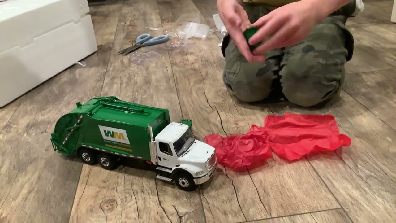 First gear one to 34 scale diecast metal replica refuse truck from first gear ￼