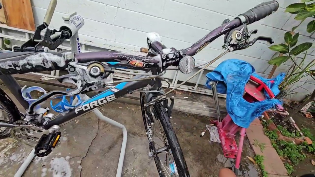 My dad restoring my old baby bike carrier..to be given to my cousin Gabriel