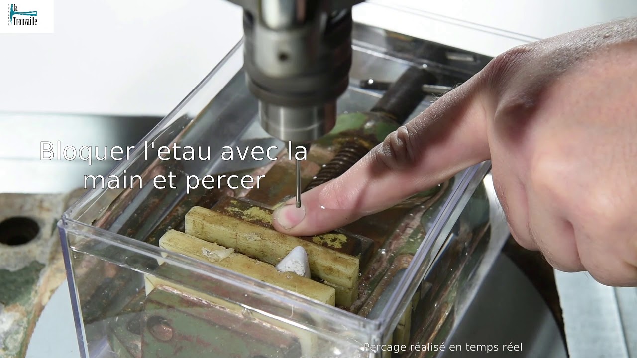 Perçage d'une pierre avec une meche pleine