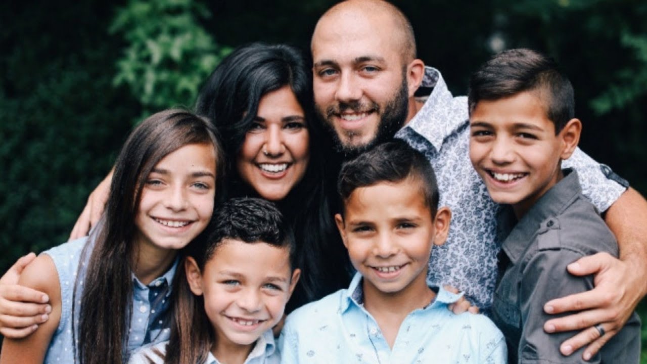 Watch Family Hilariously React To Couple Announcing Adoption of 4 Orphans