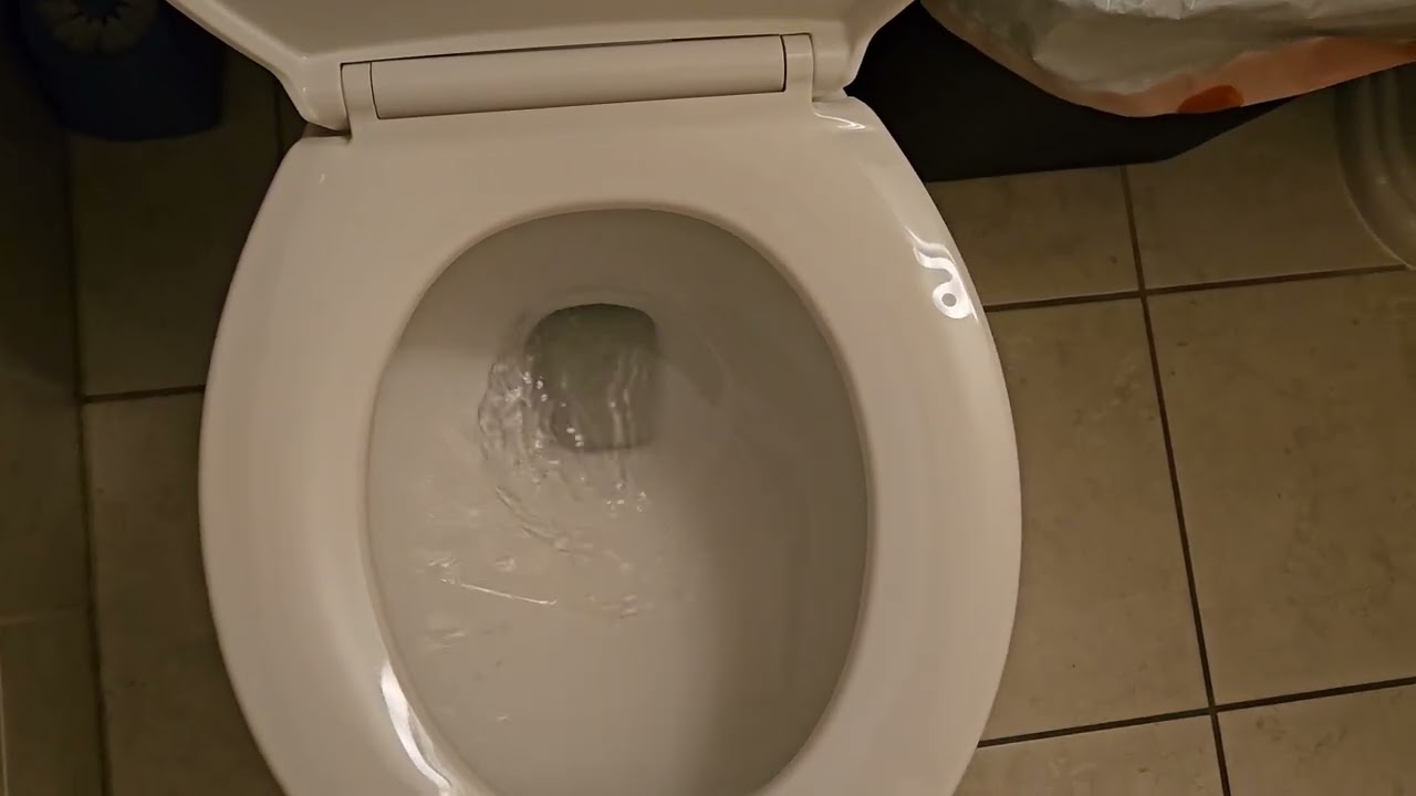 Office Building Unisex Restrooms with 2000s-20s Kohler Fixtures 