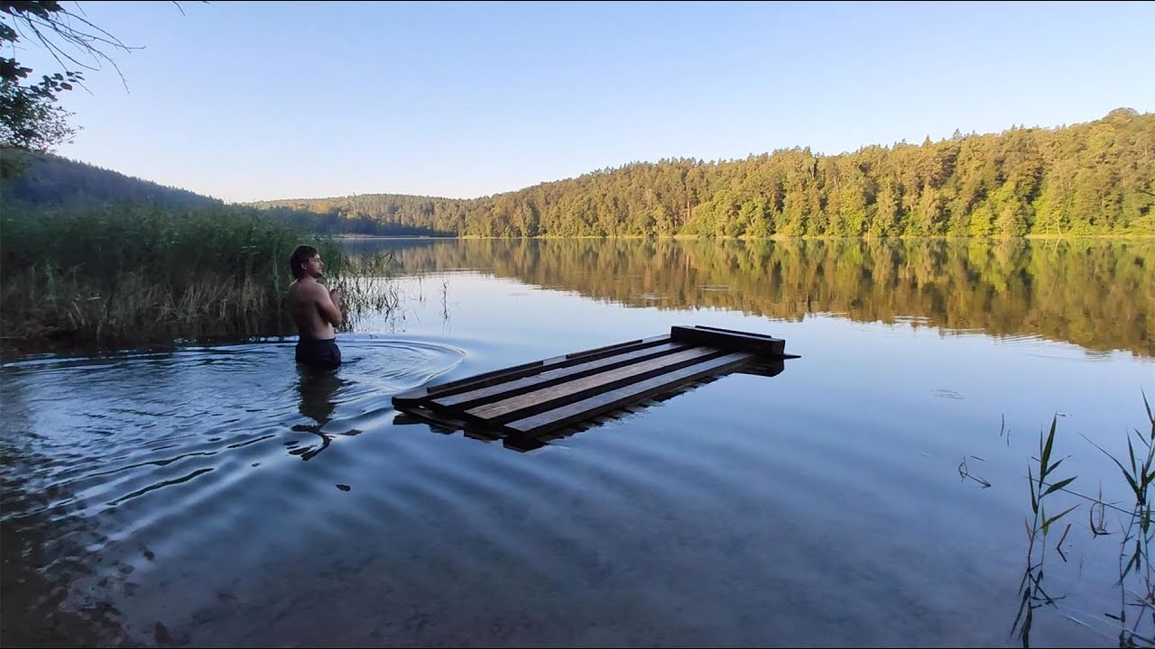 Morning swim in lake Balsys (in the Green lakes of Vilnius, Lithuania)