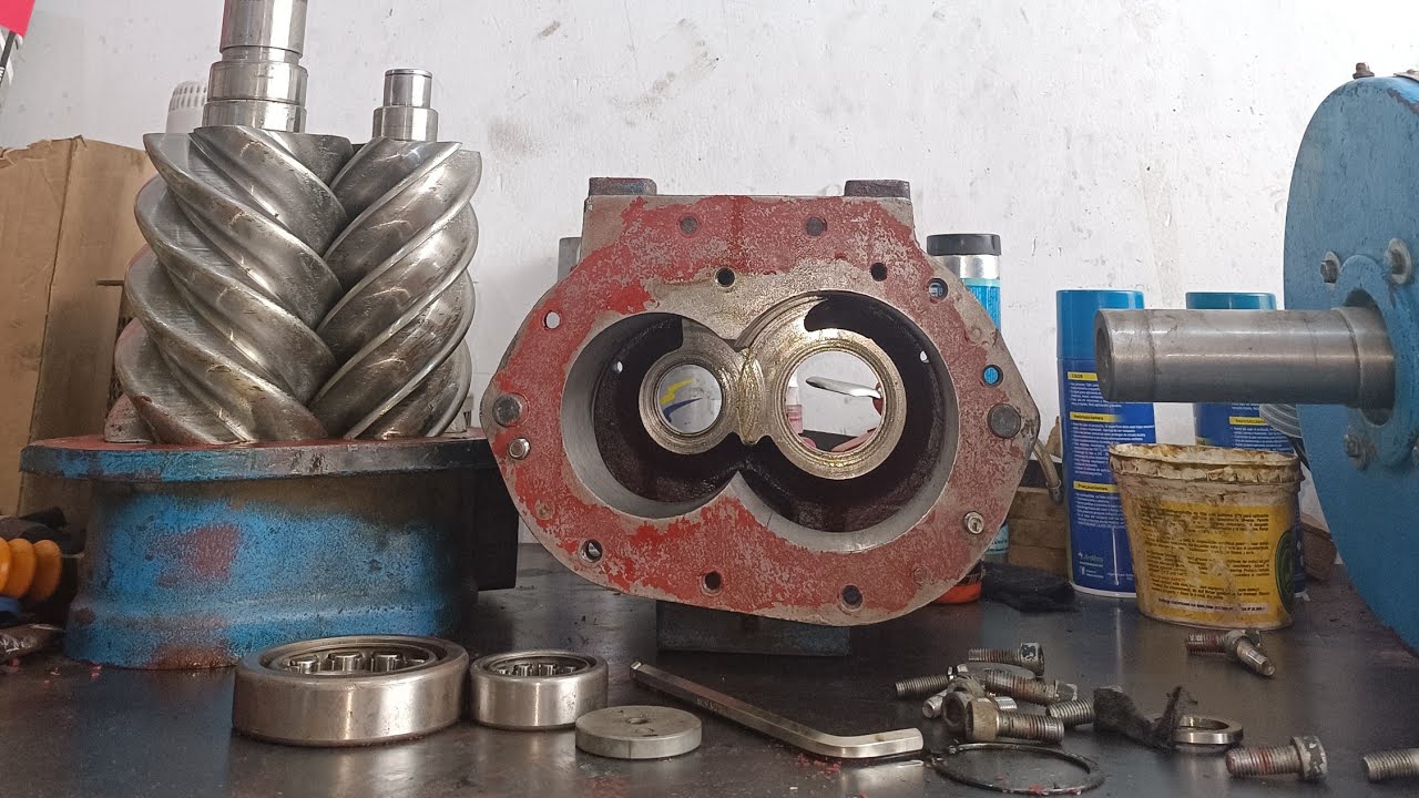 COMPRESOR DE TORNILLOS ROTATIVOS.POSICION DE LOS RODAMIENTOS.CORRECCIÓN DEL DESPLAZAMIENTO AXIAL.