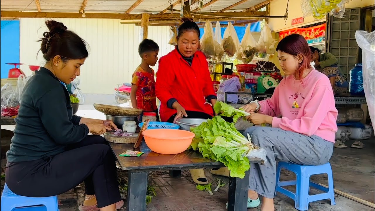 Today, we're at my mother's house enjoying a meal of pork and steamed fish with lettuce, mixed veggi