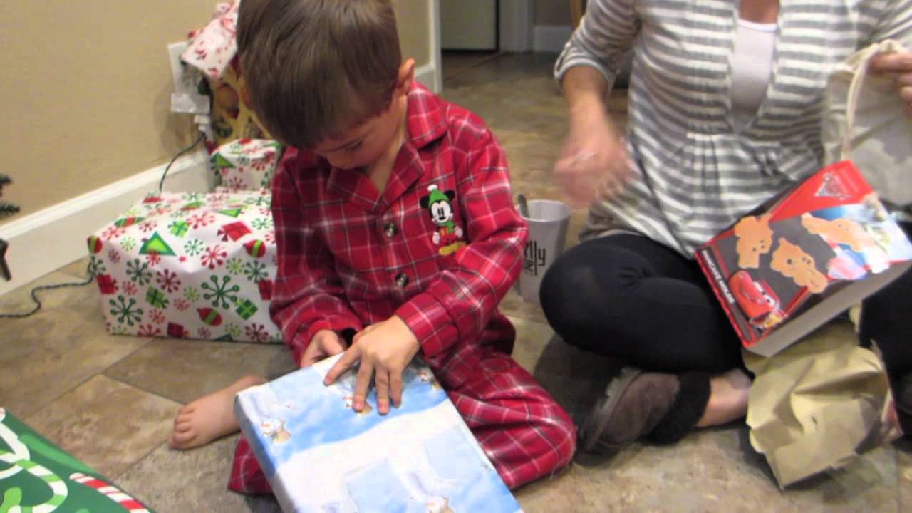 My son Joey opens presents Christmas morning 2011 - 4 years old
