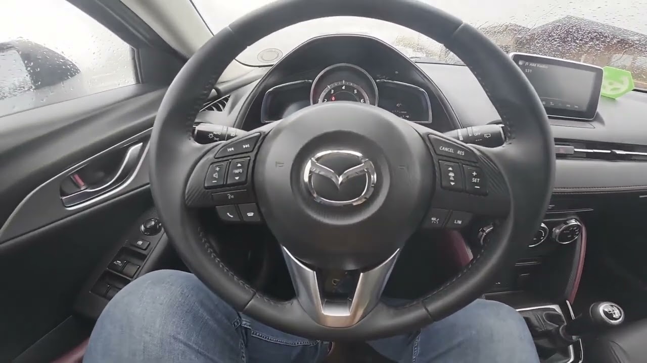 Comment activer et désactiver le chauffage arrière sur Mazda CX-3 (2015-2022)