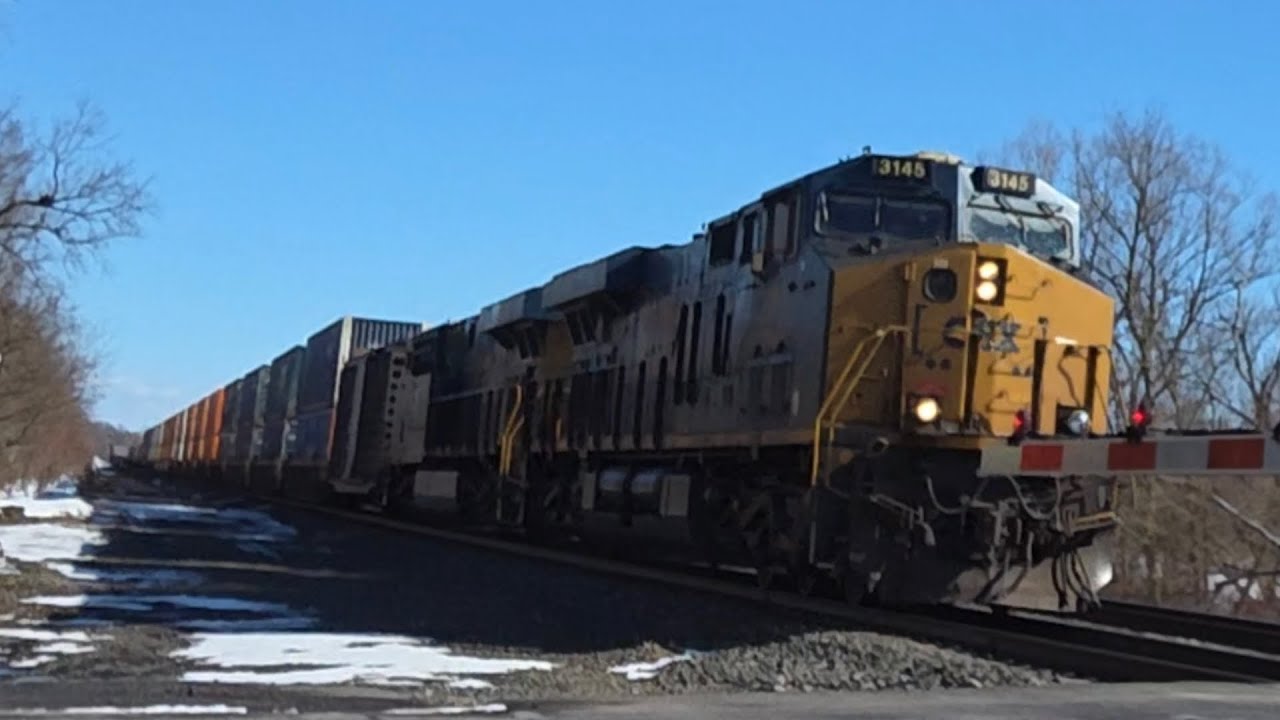 CSX intermodal train with an do not hump boxcar and DPU passes at Canaseraga rd