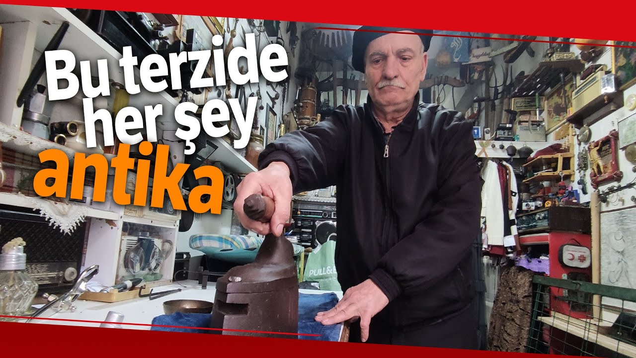 Terzi Kömürlü Ütüyle Kumaşları Ütülüyor
