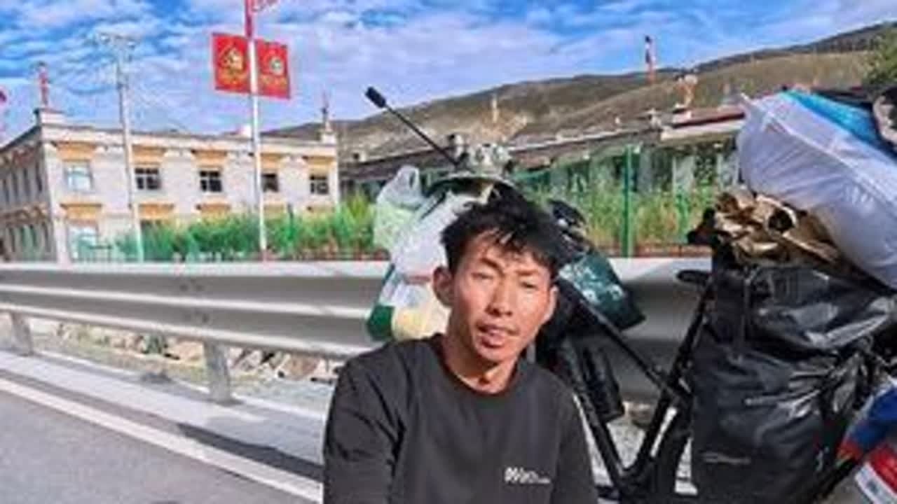 这狗狗跟了我一整天，陪我走了三十多公里，还不让别人靠近我，它这是认主人了吗？#骑行新疆#318川藏线