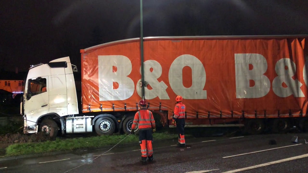 Operation to recover B and Q lorry from side of house in Harlow