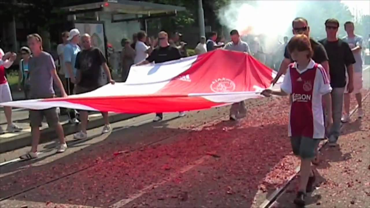 Ajax fans marching through Amsterdam in memory of Joark