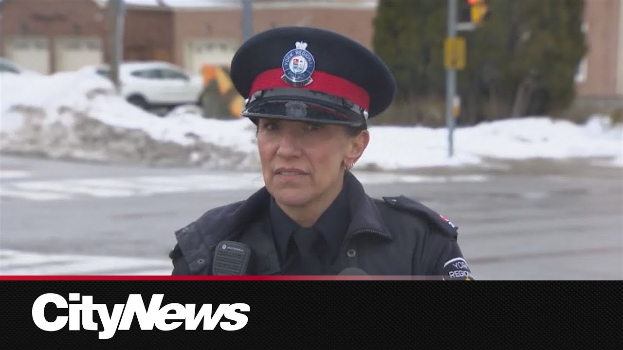 Hit and run suspect knowingly drove with victim on hood of car, police allege