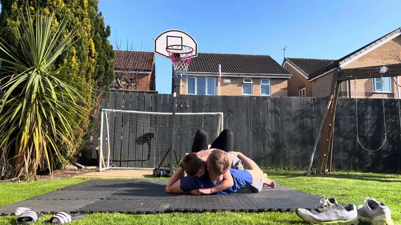 Grappling with dad in the sun