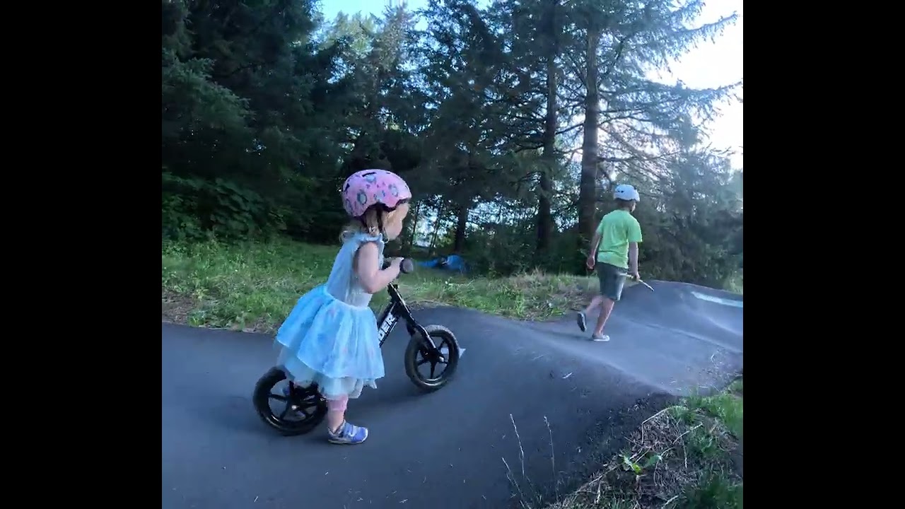 Our almost-3-year-old ripping up the Pump Track on her Strider bike!