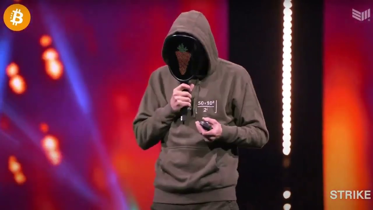 Bitcoin is the moral choice, says Rational Root, speaking from behind a mask at Amsterdam 2024