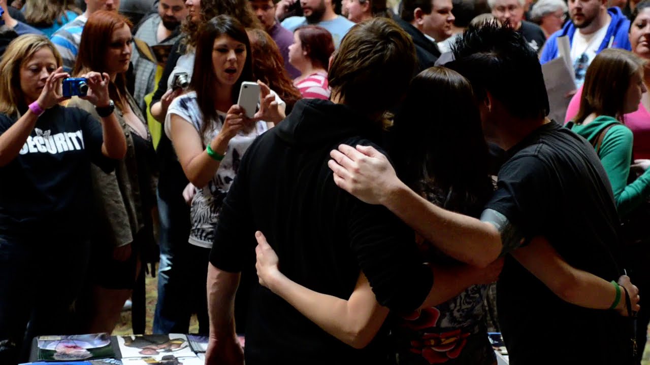 Norman Reedus posing with fans at Chiller Theatre Expo April 2012 Parsippany Hilton  by Bill Baker